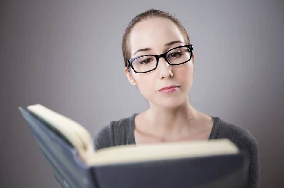 student reading book